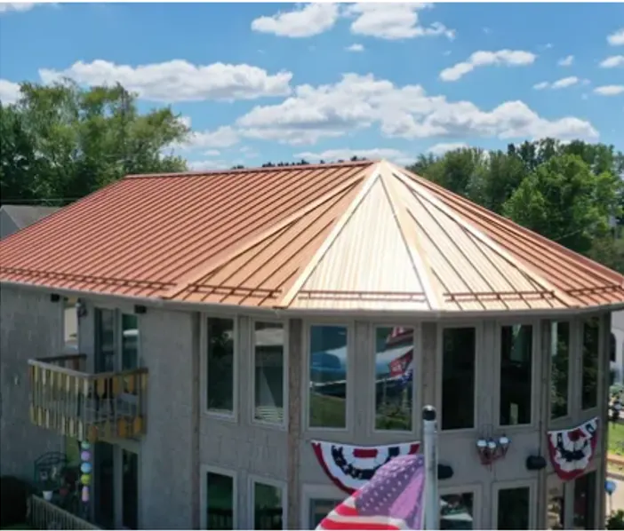Storm damage documented on a St. Paul metal roof